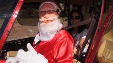 Papai Noel chega a santiago de helicóptero