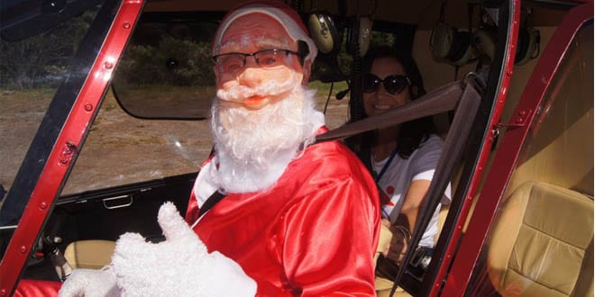 Papai Noel chega a santiago de helicóptero